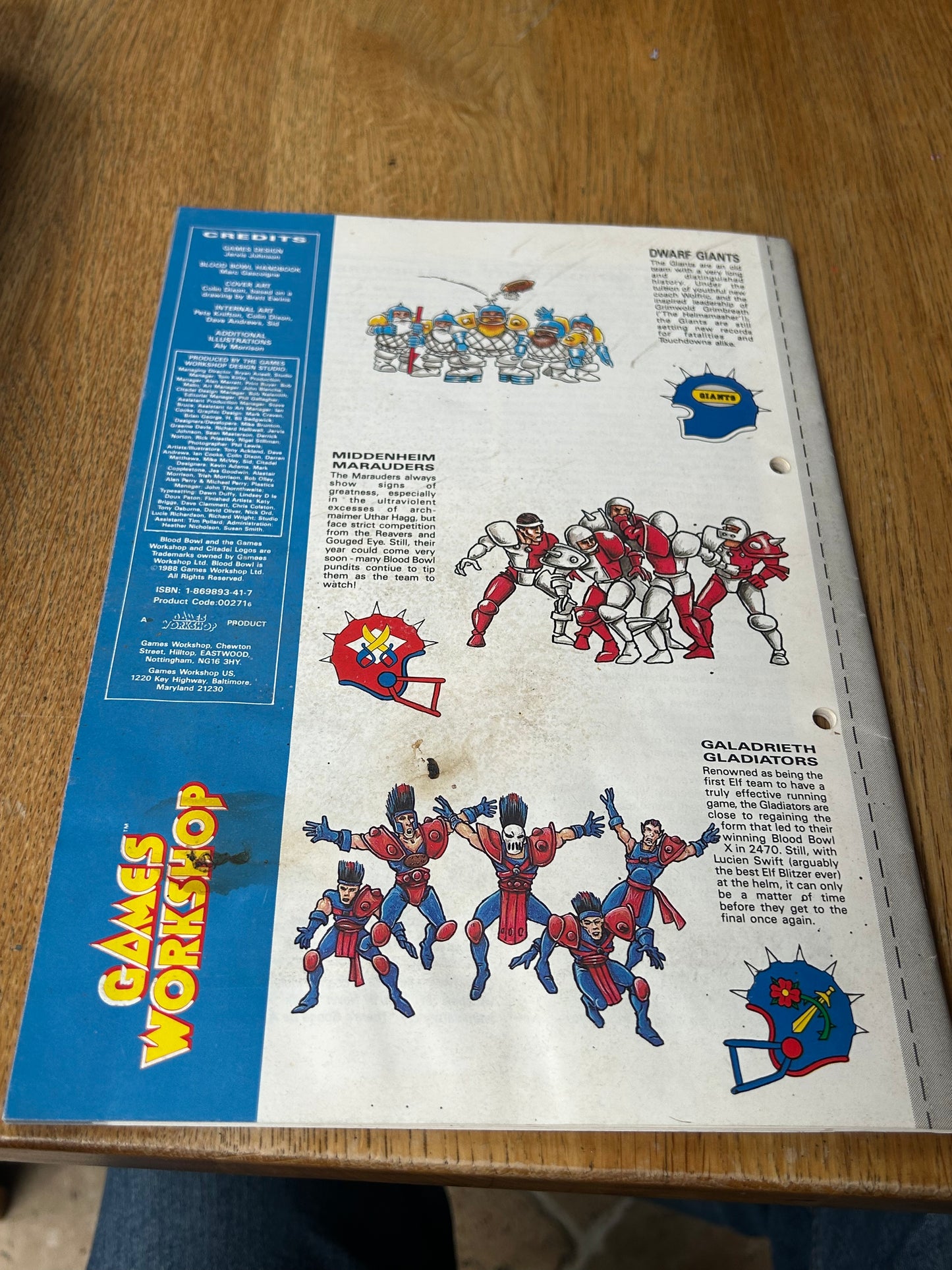 Bloodbowl second edition handbook (has some paint that’s bled through the back)