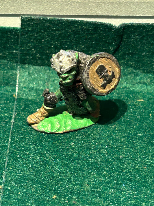 Warhammer fantasy c15 armoured orc advancing with sword and shield
