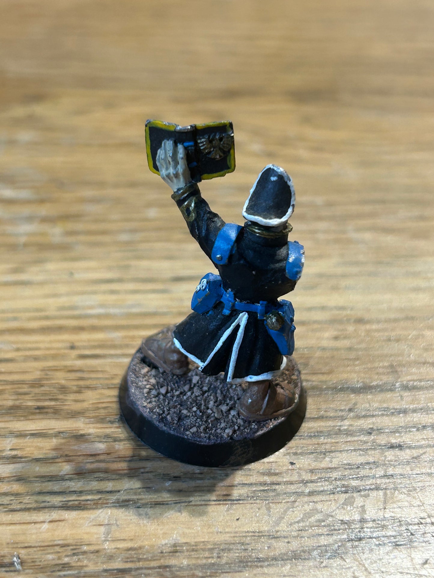 Rogue Trader Imperial Guard Commissar holding book (no plastic arm or weapon)