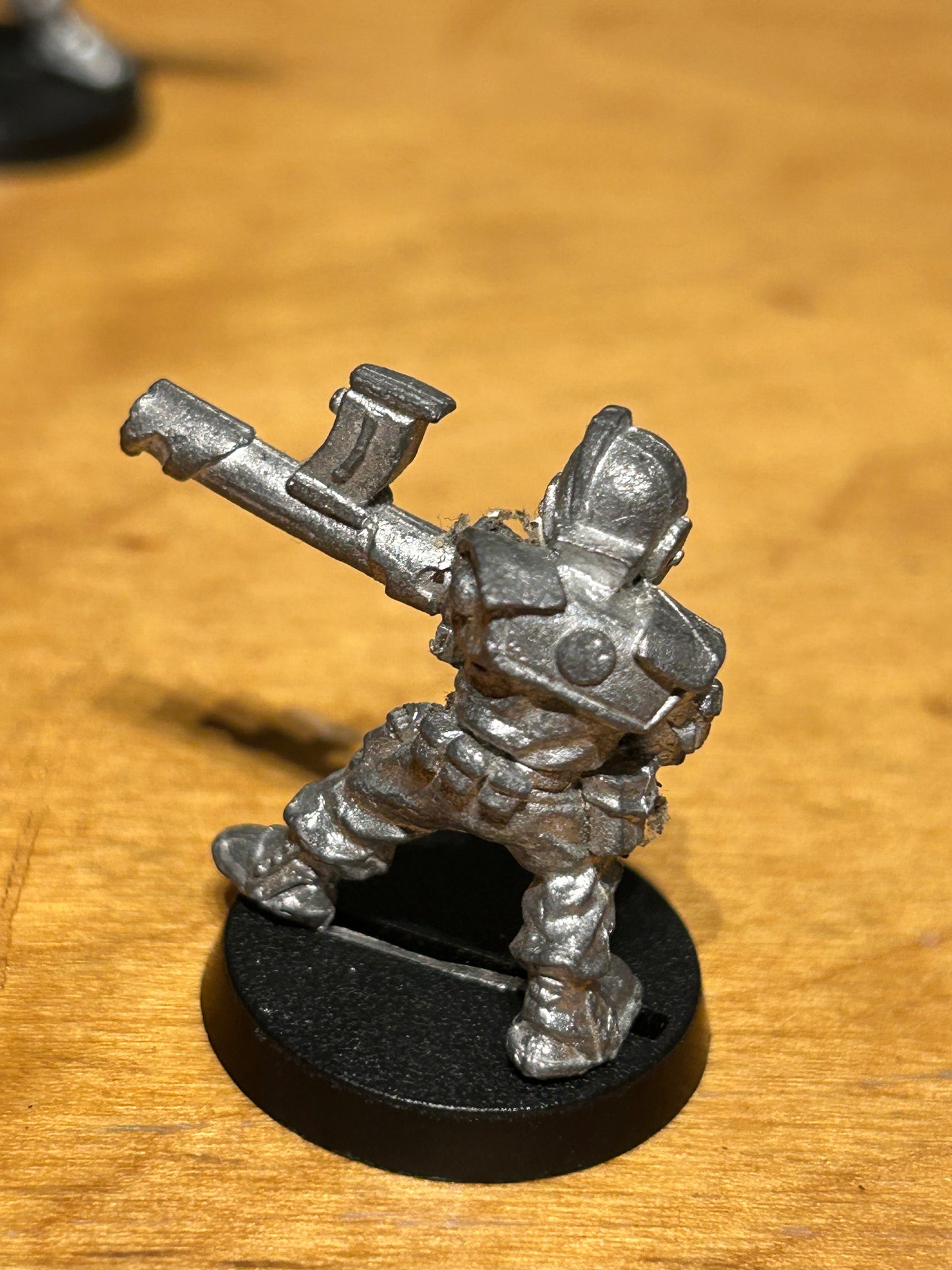 Rogue Trader Imperial Guard Grenadier grenade launcher (has some paint flakes stuck to him)
