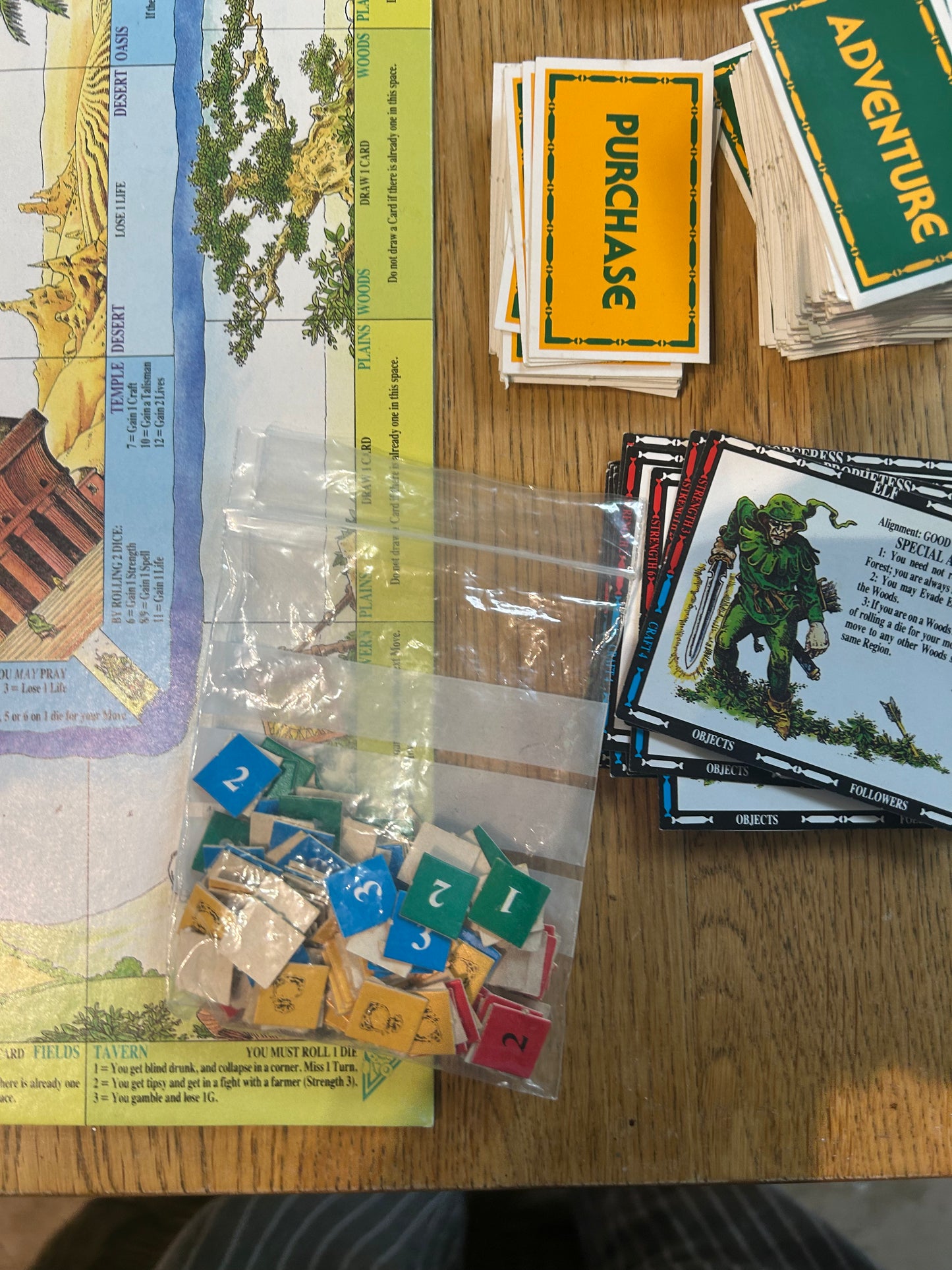 Talisman second edition (near complete but missing rules and two out of 40 blue tokens) come with 14 extra character cards and info sheets, 36 extra adventure cards and 6 extra spell cards all shown in the last few photos