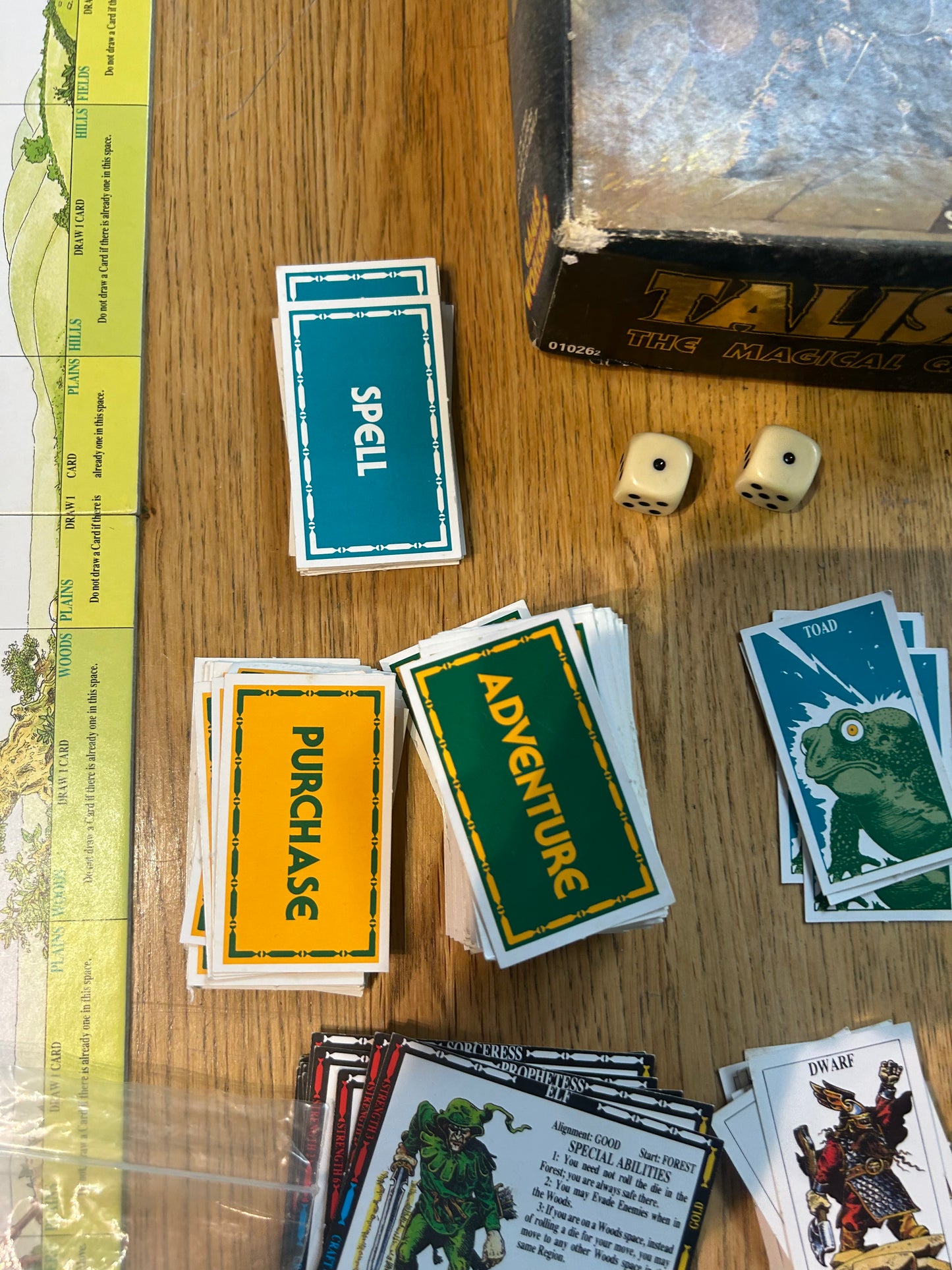 Talisman second edition (near complete but missing rules and two out of 40 blue tokens) come with 14 extra character cards and info sheets, 36 extra adventure cards and 6 extra spell cards all shown in the last few photos