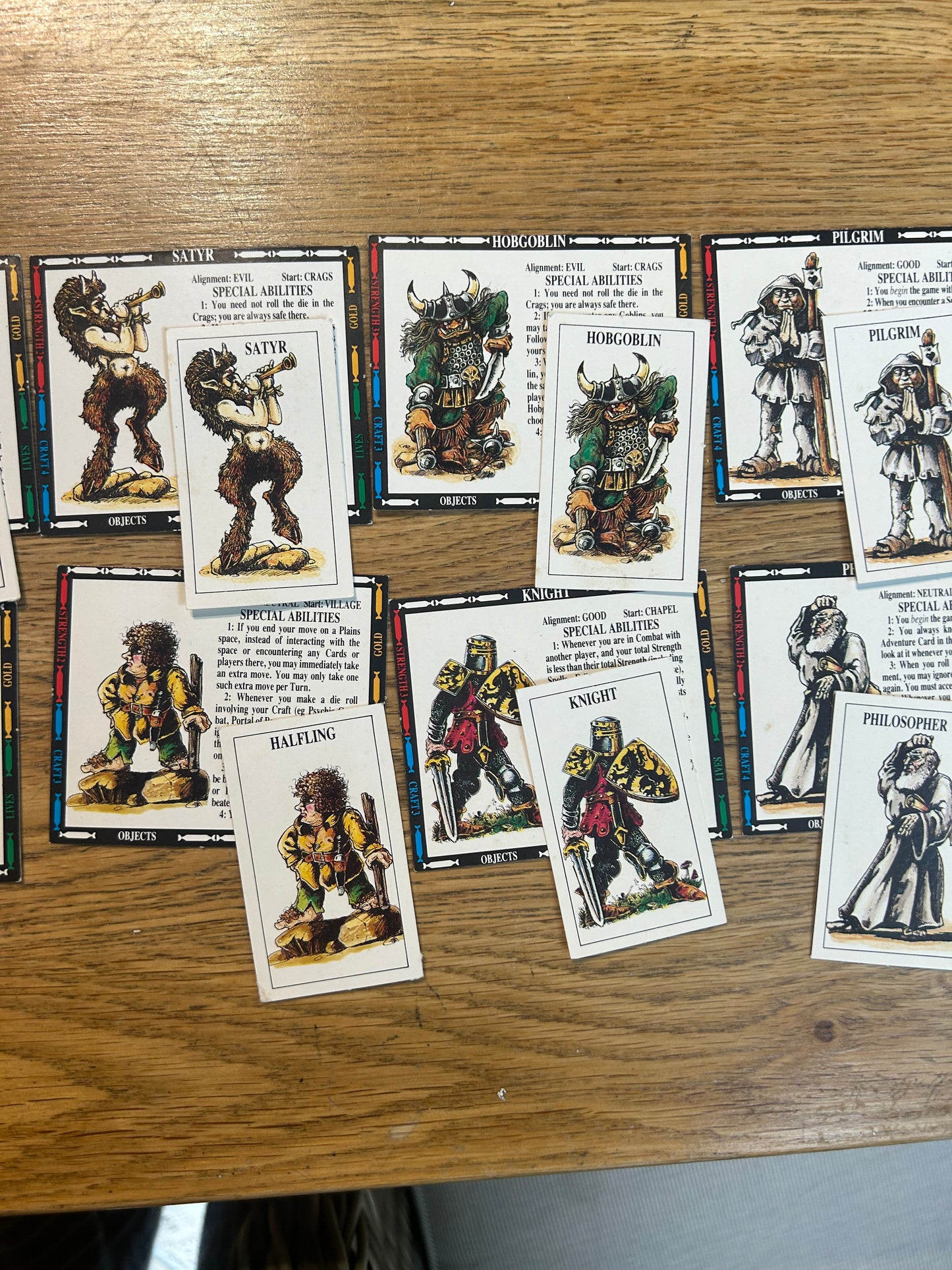 Talisman second edition (near complete but missing rules and two out of 40 blue tokens) come with 14 extra character cards and info sheets, 36 extra adventure cards and 6 extra spell cards all shown in the last few photos