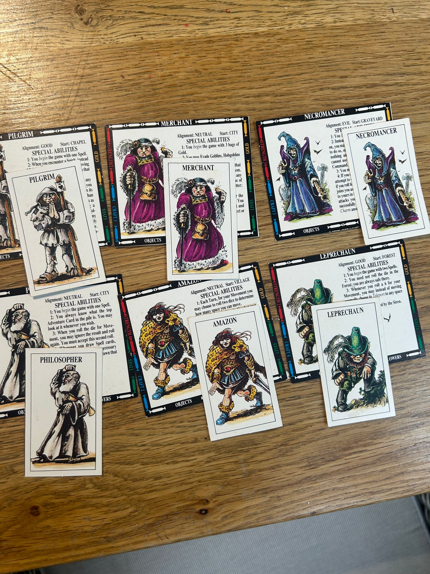 Talisman second edition (near complete but missing rules and two out of 40 blue tokens) come with 14 extra character cards and info sheets, 36 extra adventure cards and 6 extra spell cards all shown in the last few photos
