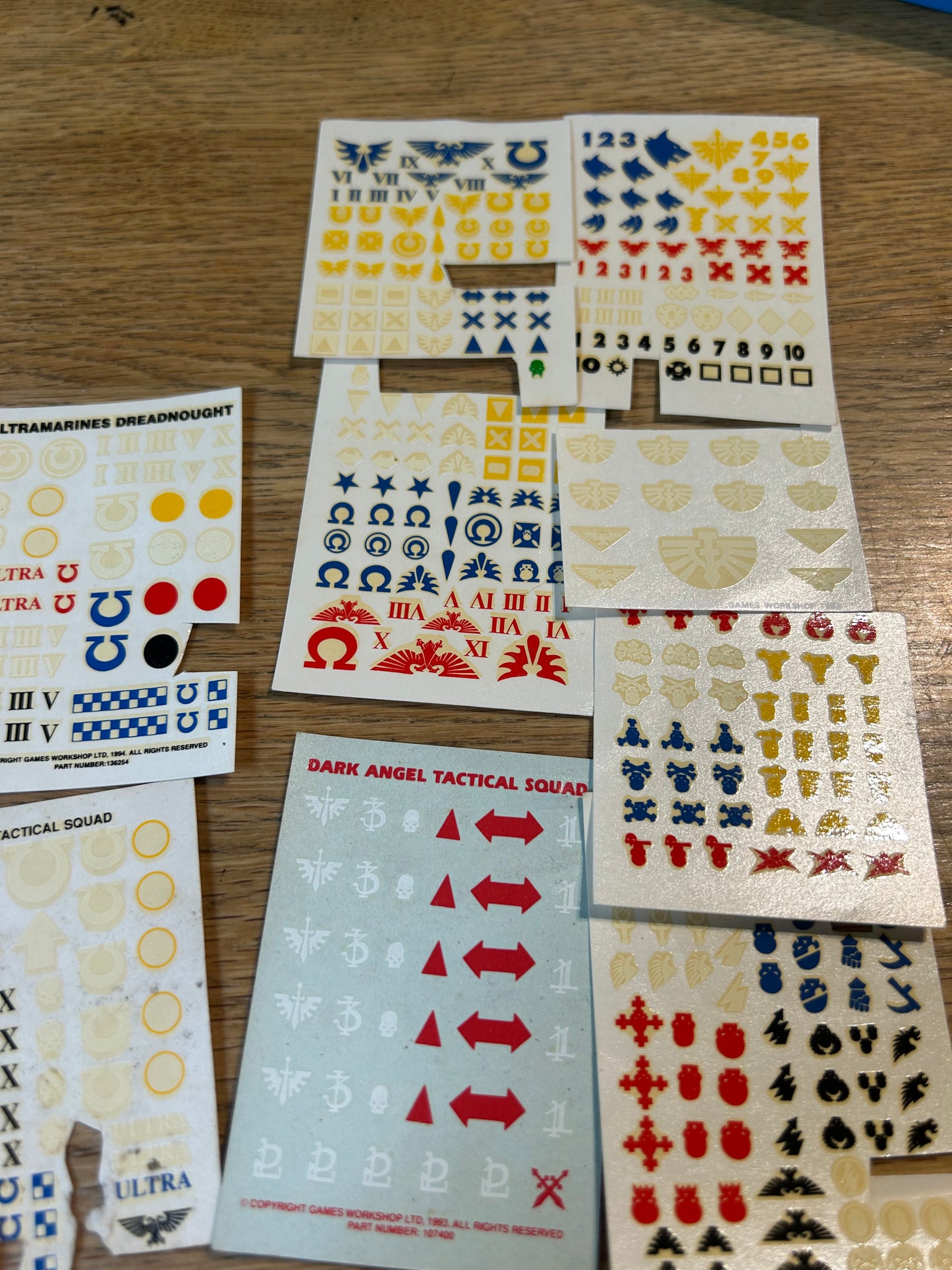 Partially used warhammer fantasy and 40k transfer sheets job lot (mostly space marines and a few bretonnians)
