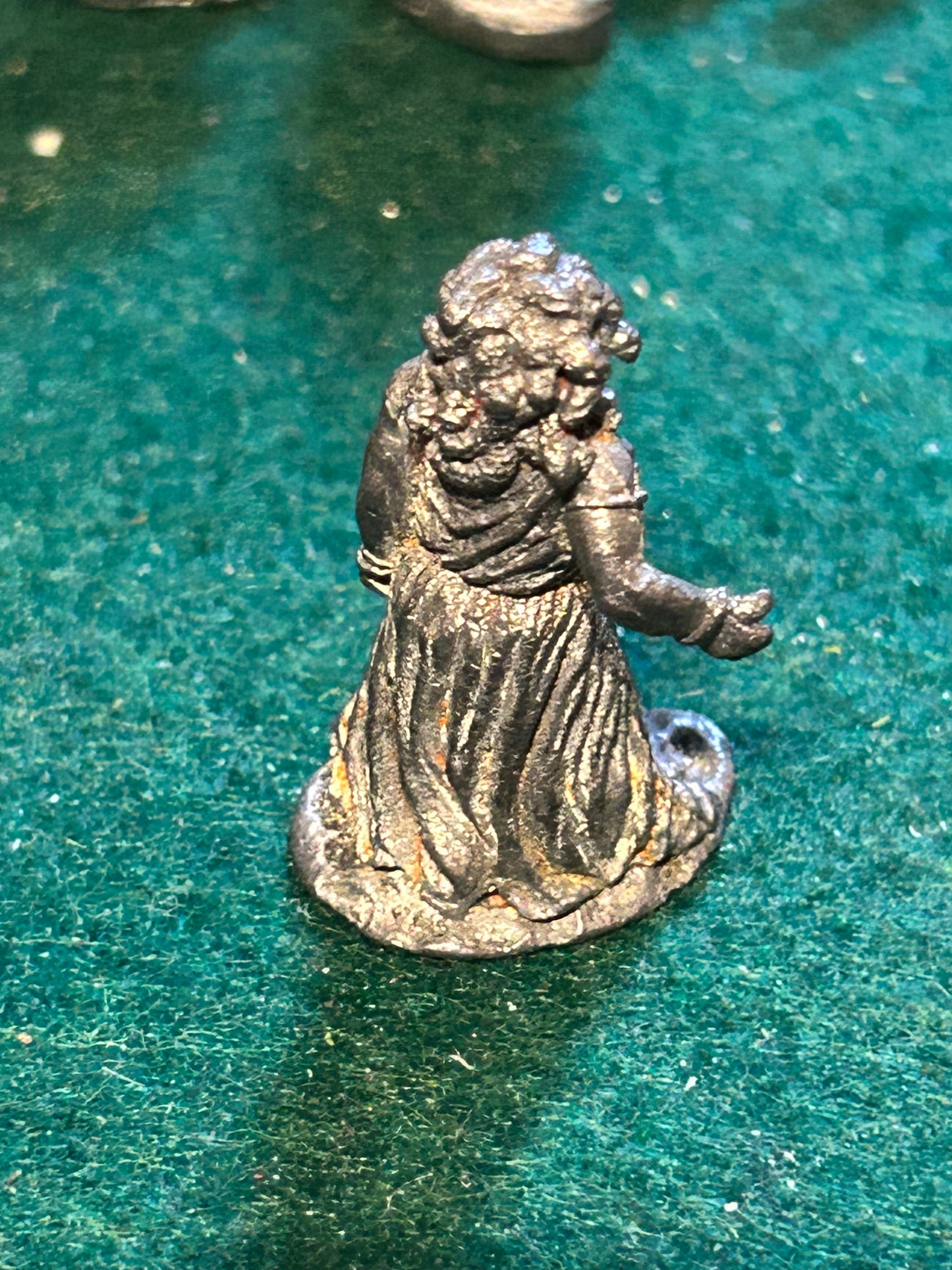 Metal magic female (could be a peasant or a priestess/witch)