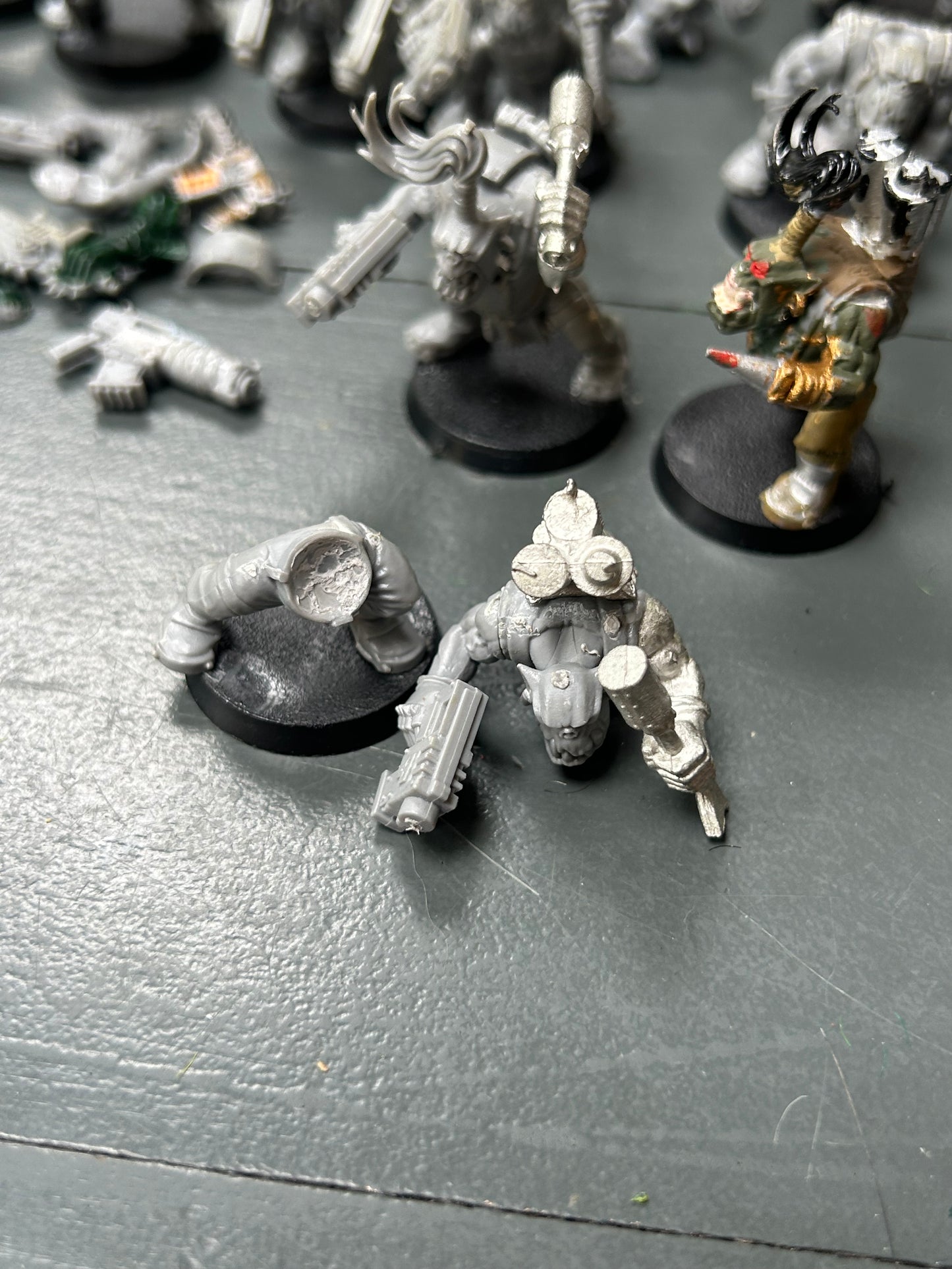 Warhammer 40k plastic ork boys x22 (various states of wear but includes some parts to fix some of them up. Also includes stikk bomb metal parts)