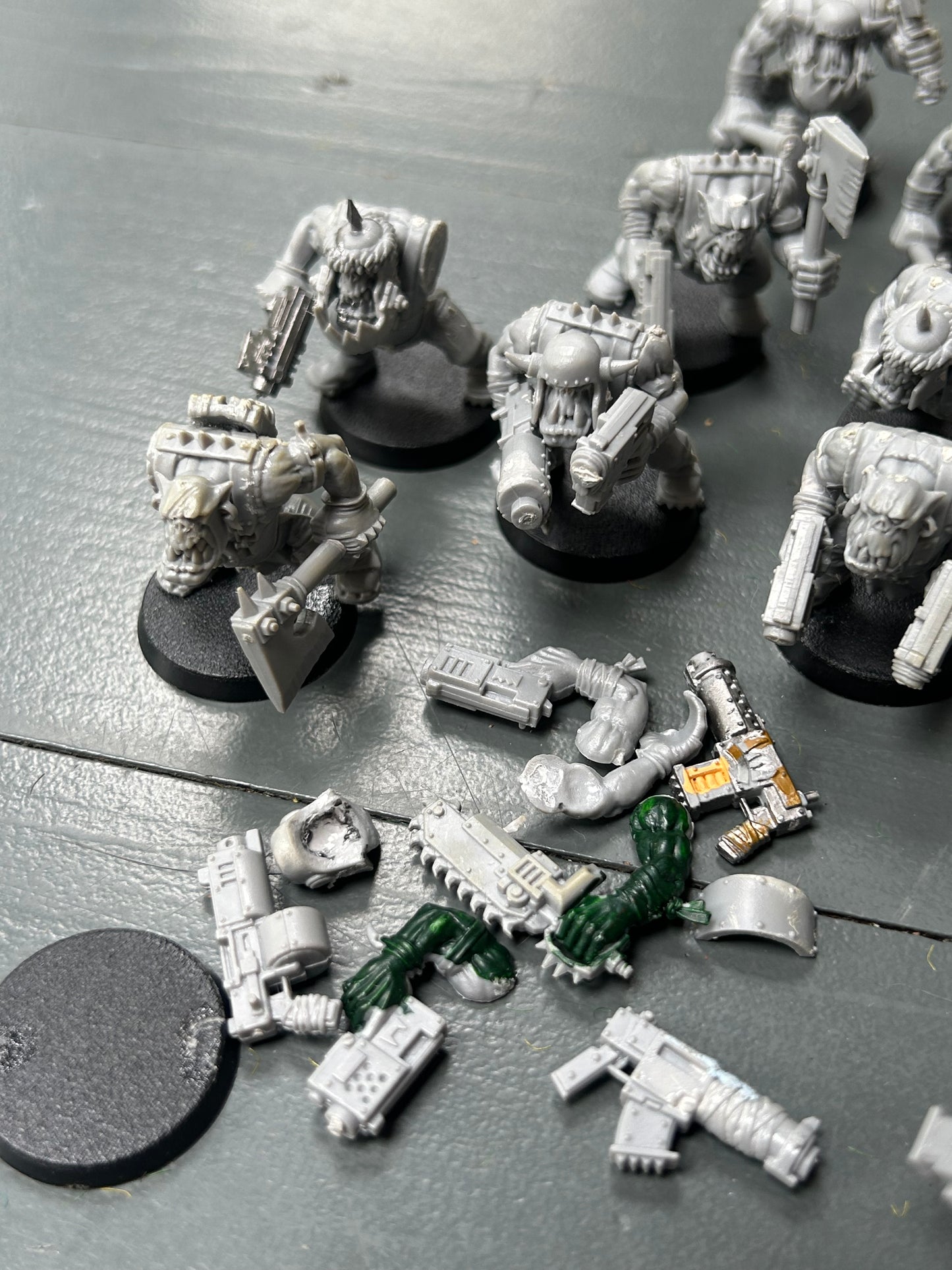 Warhammer 40k plastic ork boys x22 (various states of wear but includes some parts to fix some of them up. Also includes stikk bomb metal parts)