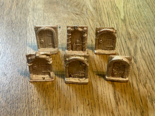 Torchlight resin dungeon doors x6 (one has a little damage to top right of door)