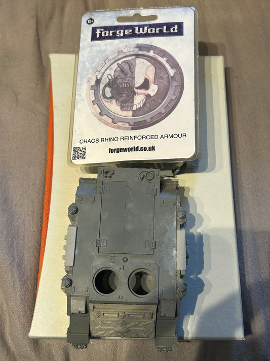 Forge world chaos rhino reinforced rhino conversion kit and rhino (one kit is mostly still on Sprue with two bits used, alongside a second kit I believe that has been used to)