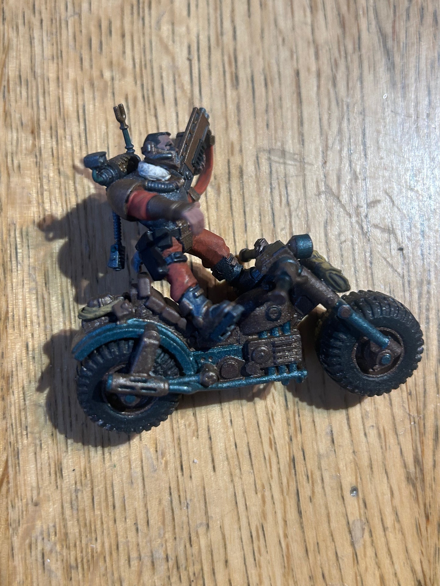 Warhammer 40k space marine scout on bike (Genestealer cults bike I believe)