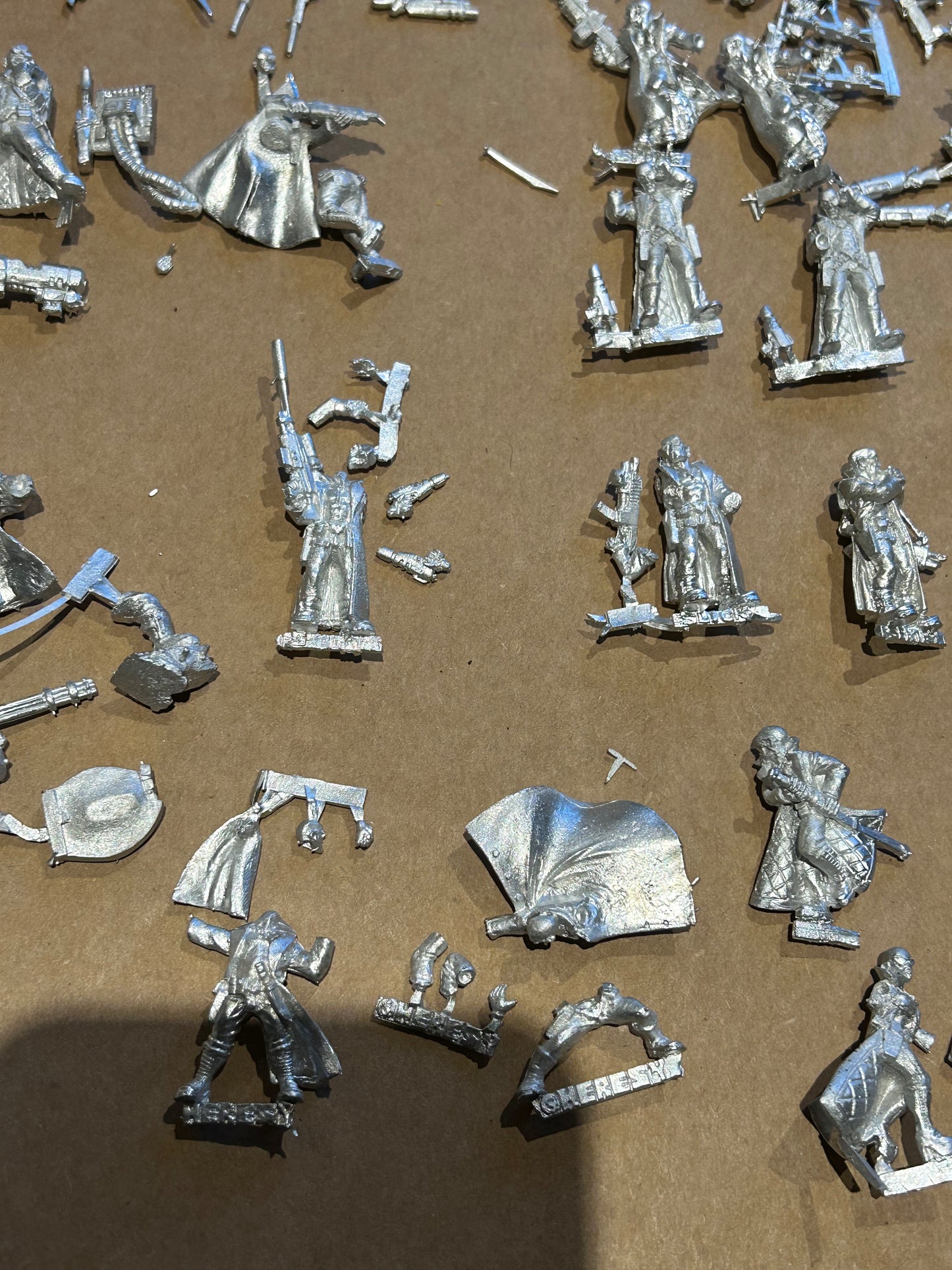 Necromunda proxy delaque gang heresy miniature trench coat gang 24 gang members with a wide variety of poses and weaponry
