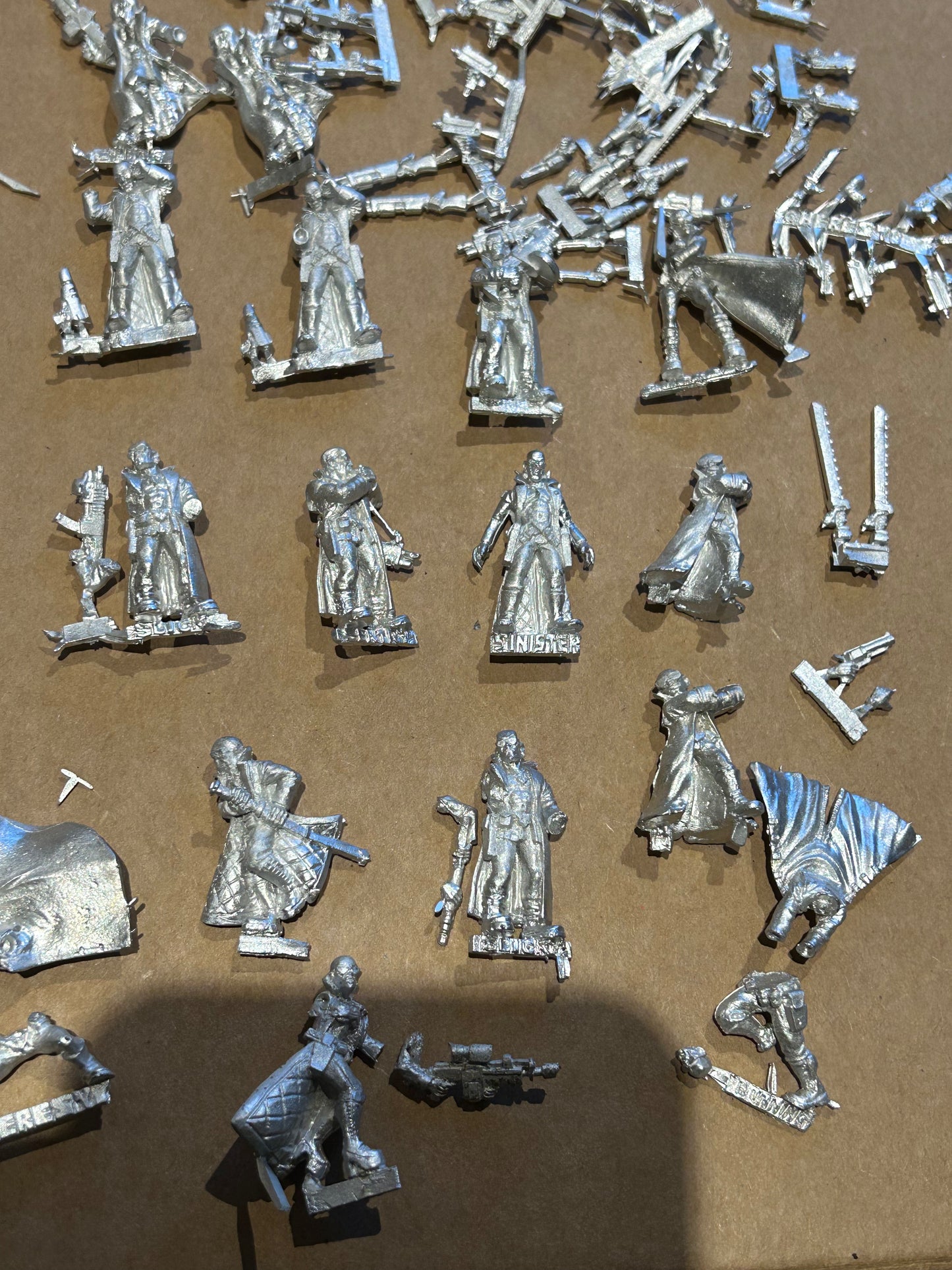 Necromunda proxy delaque gang heresy miniature trench coat gang 24 gang members with a wide variety of poses and weaponry