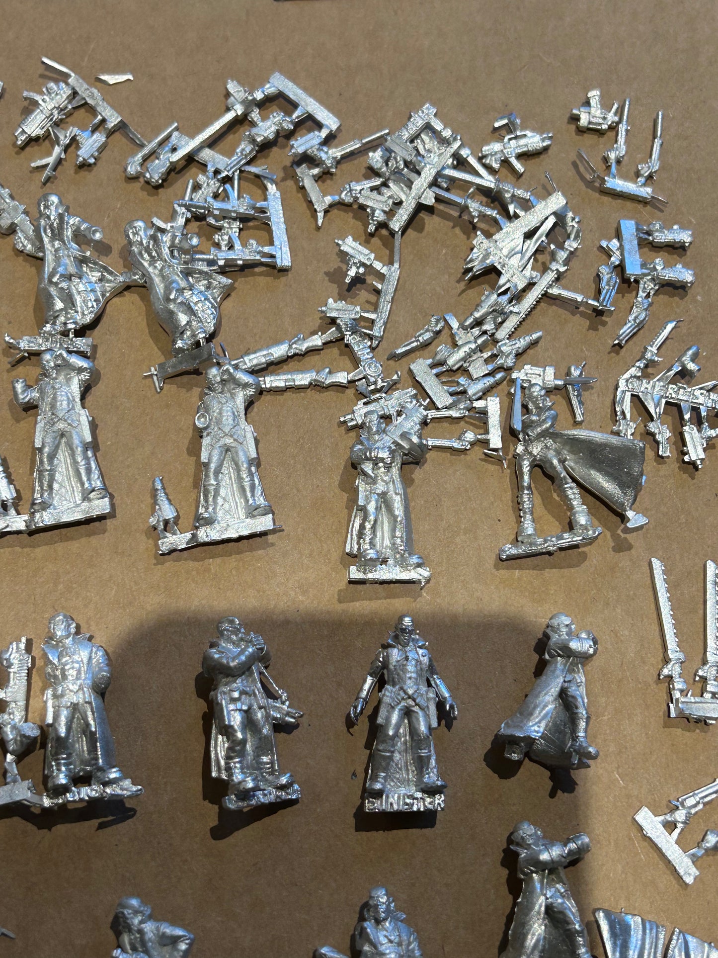 Necromunda proxy delaque gang heresy miniature trench coat gang 24 gang members with a wide variety of poses and weaponry