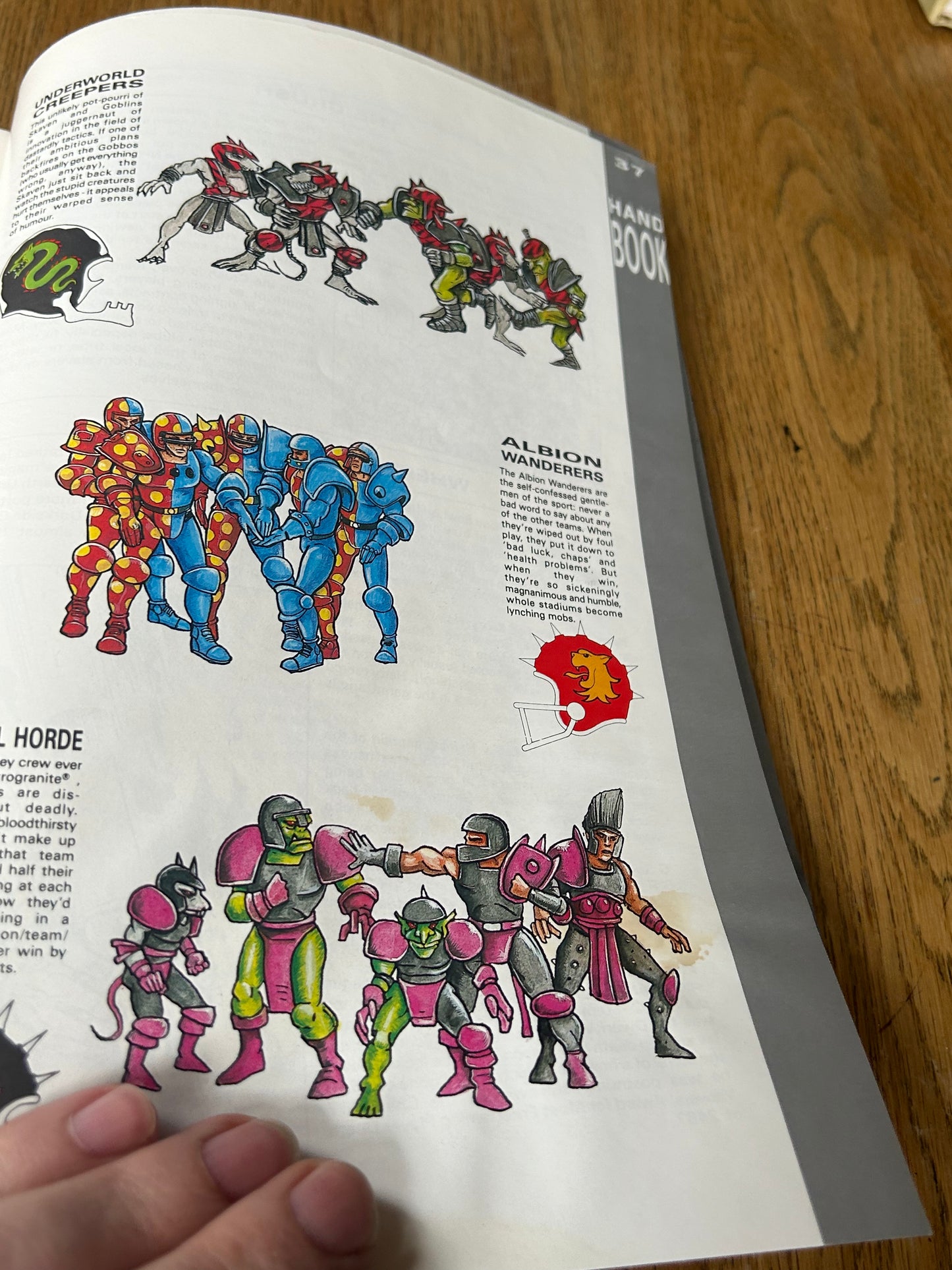 Bloodbowl second edition handbook (has some paint that’s bled through the back)