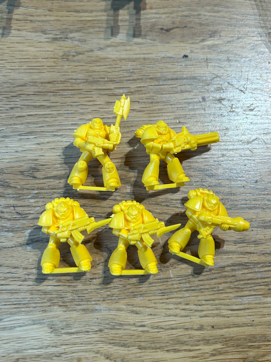 Warhammer 40k space crusade marine squad (5 marines with a mix of weaponry).