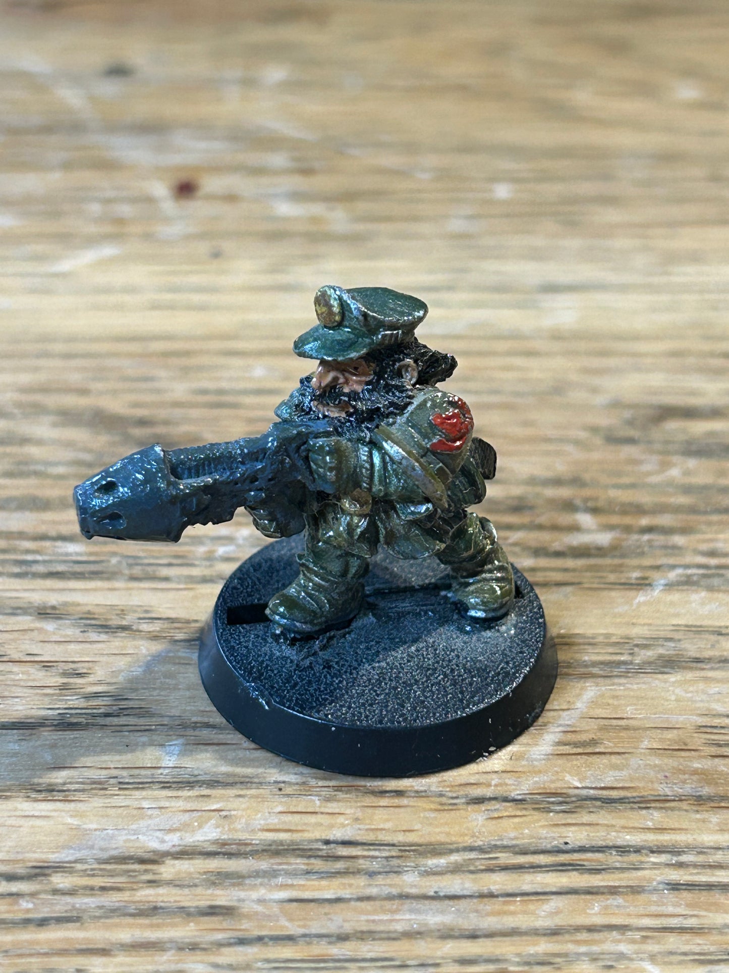 Warhammer 40k Rogue Trader squat with plasma gun iron claw