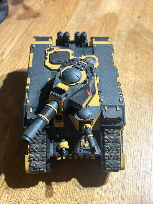 Warhammer 40k space marines or imperial guard converted leman Russ or land raider (not sure) done up to be red scorpions chapter