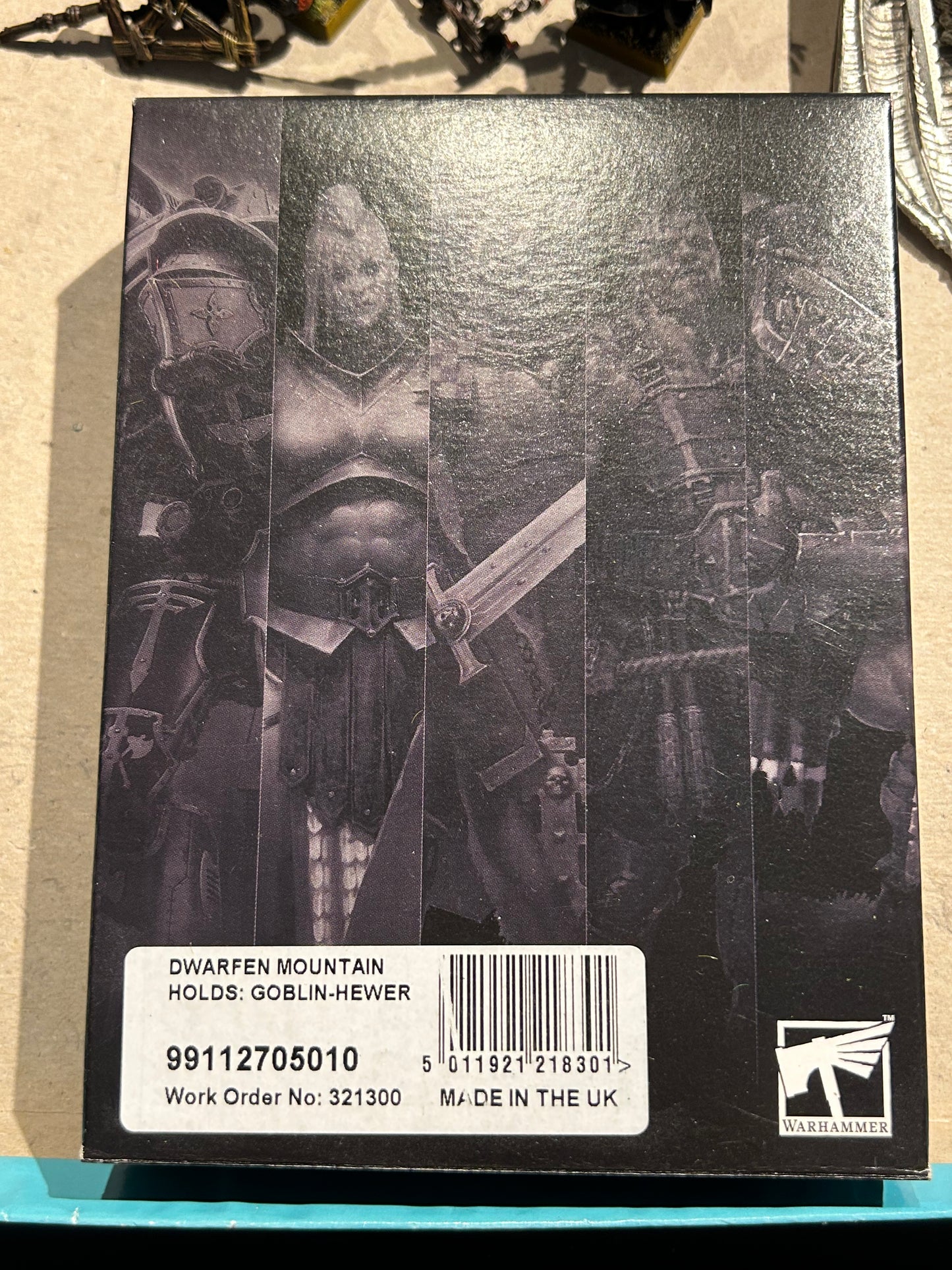 Dwarfed mountain holds goblin hewer boxed