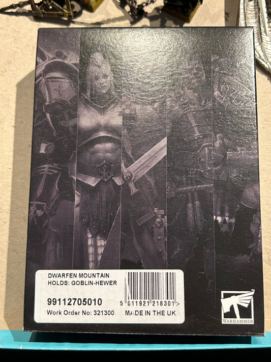 Dwarfed mountain holds goblin hewer boxed