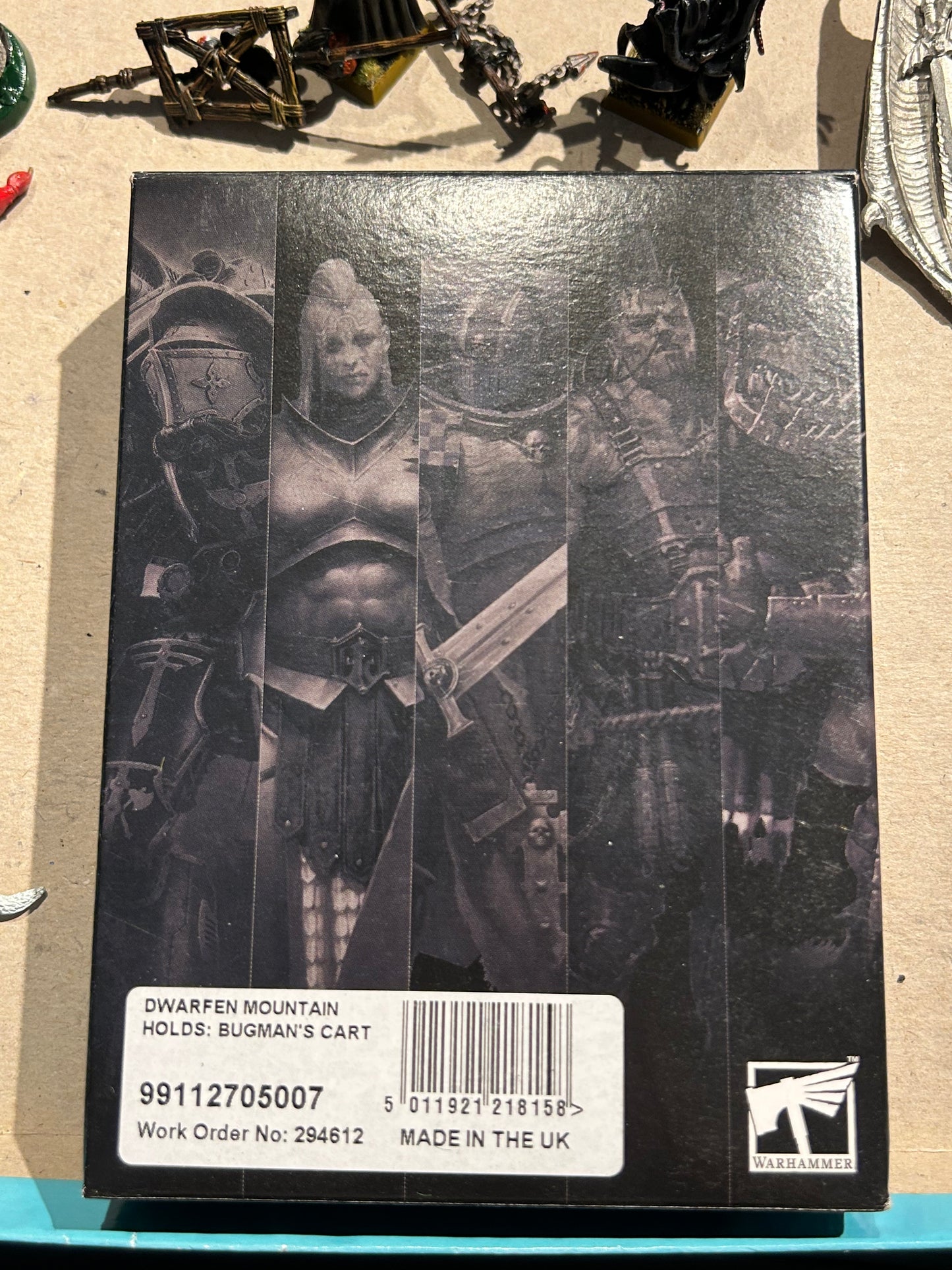 Dwarfed mountain holds Bugman’s cart boxed