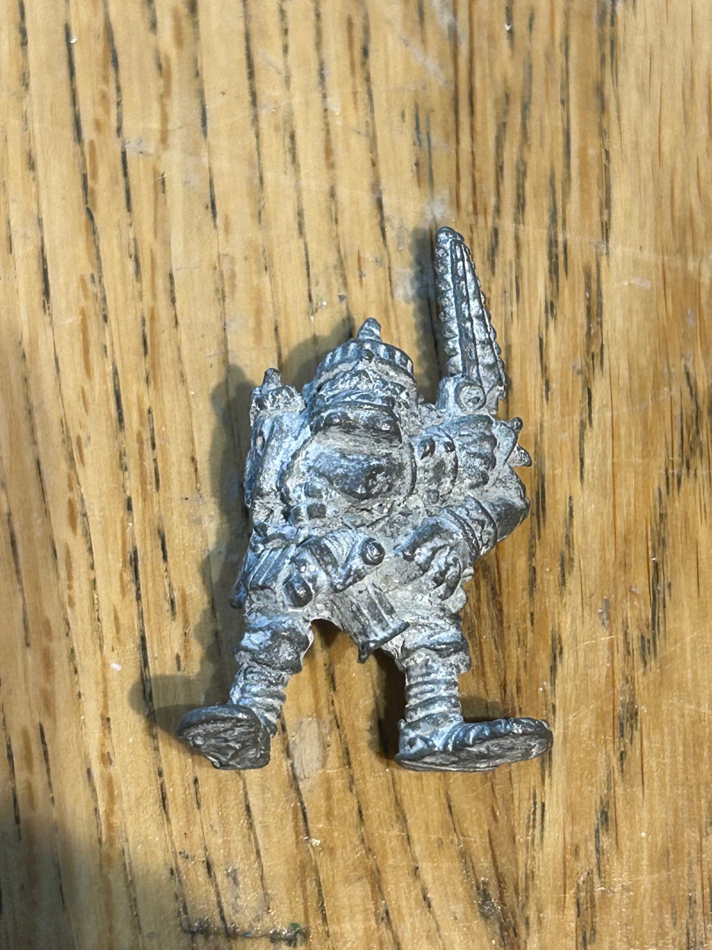 Warhammer 40k Space Ork  with bolta and chainsword (no tab and has primer in his recesses from where he was stripped).