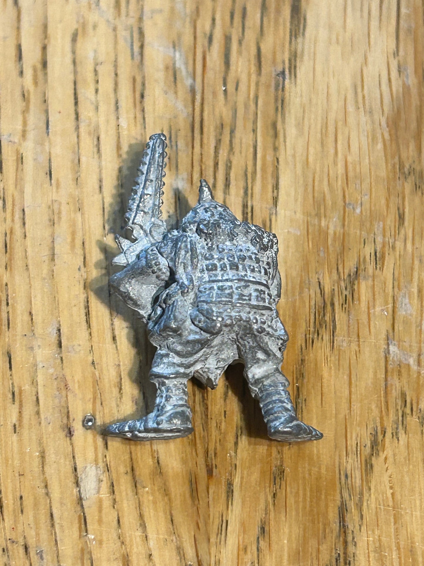 Warhammer 40k Space Ork  with bolta and chainsword (no tab and has primer in his recesses from where he was stripped).
