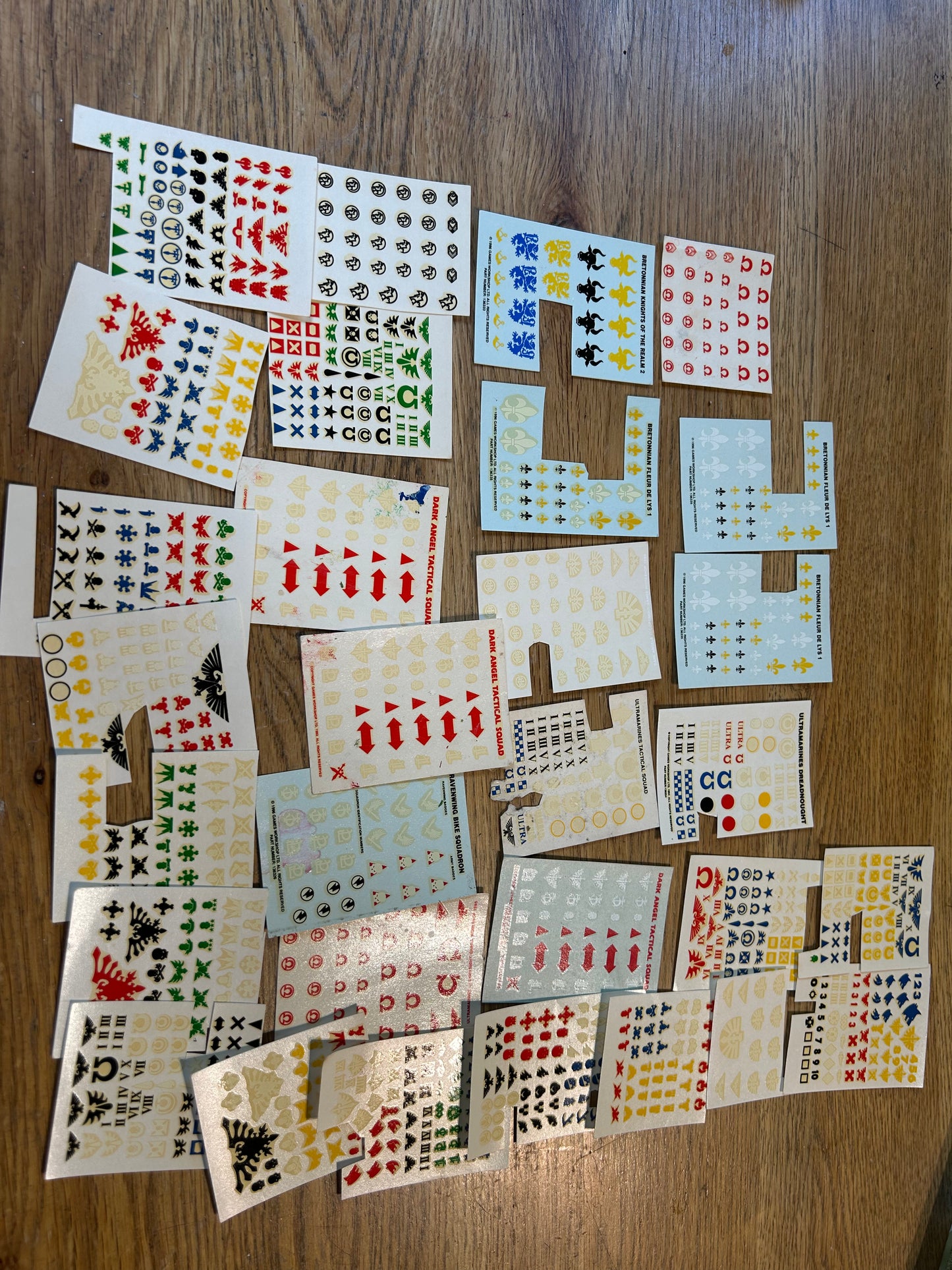 Partially used warhammer fantasy and 40k transfer sheets job lot (mostly space marines and a few bretonnians)