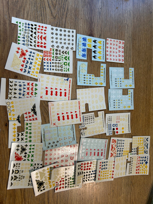 Partially used warhammer fantasy and 40k transfer sheets job lot (mostly space marines and a few bretonnians)