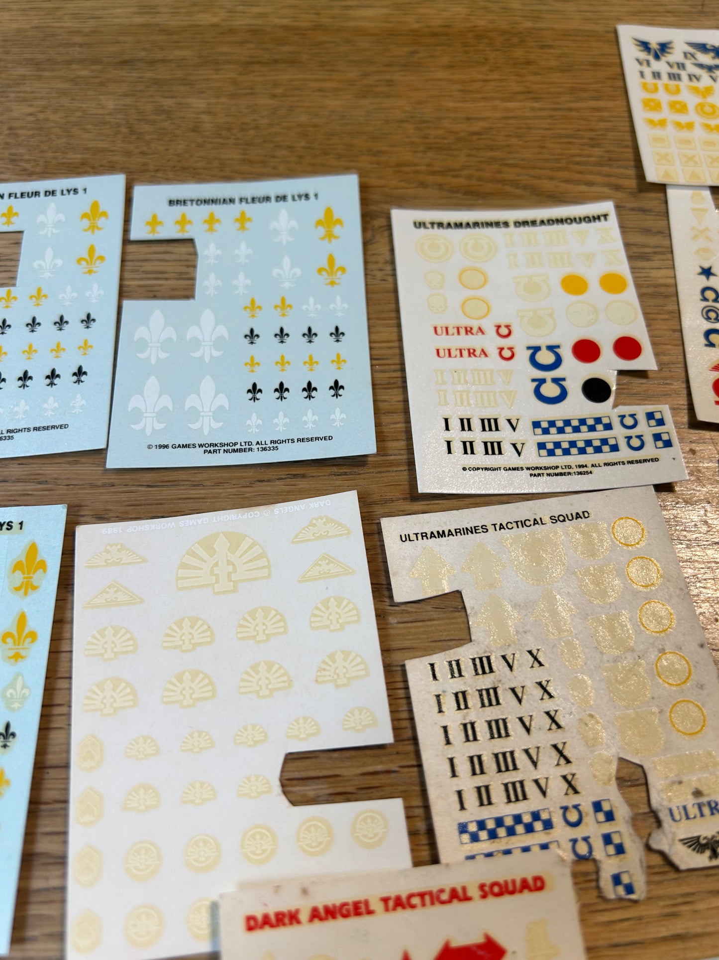 Partially used warhammer fantasy and 40k transfer sheets job lot (mostly space marines and a few bretonnians)