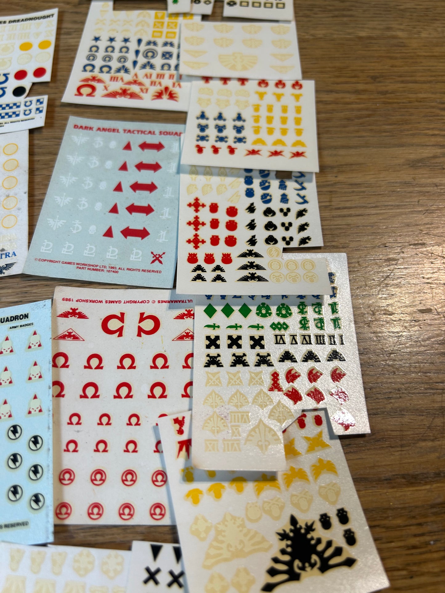 Partially used warhammer fantasy and 40k transfer sheets job lot (mostly space marines and a few bretonnians)
