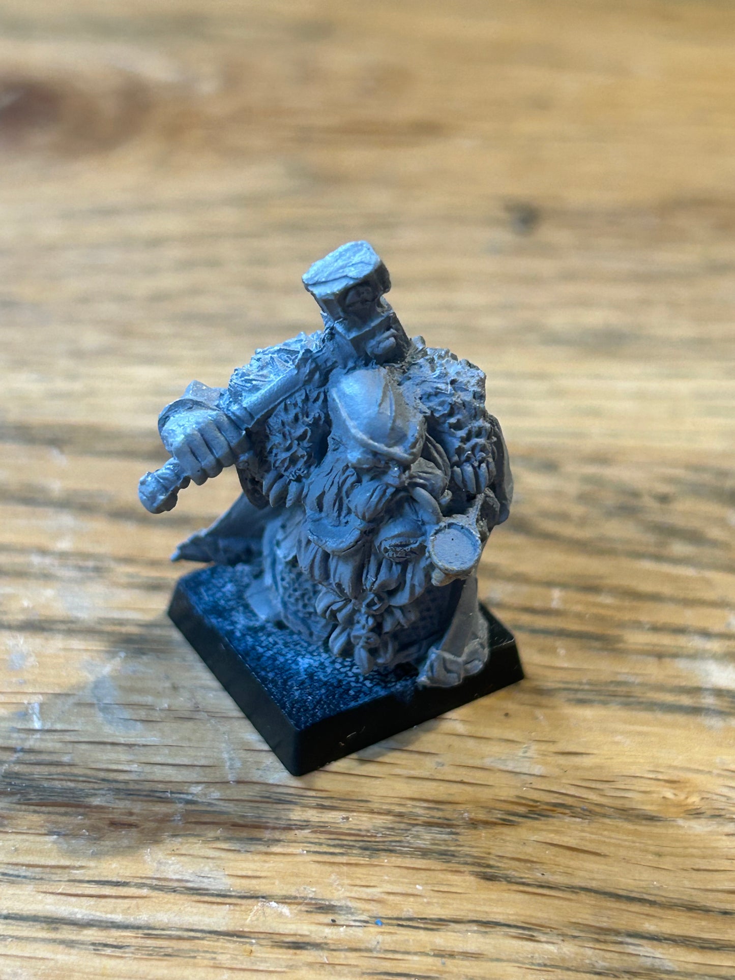 Warhammer fantasy dwarf lord with hammer and pipe