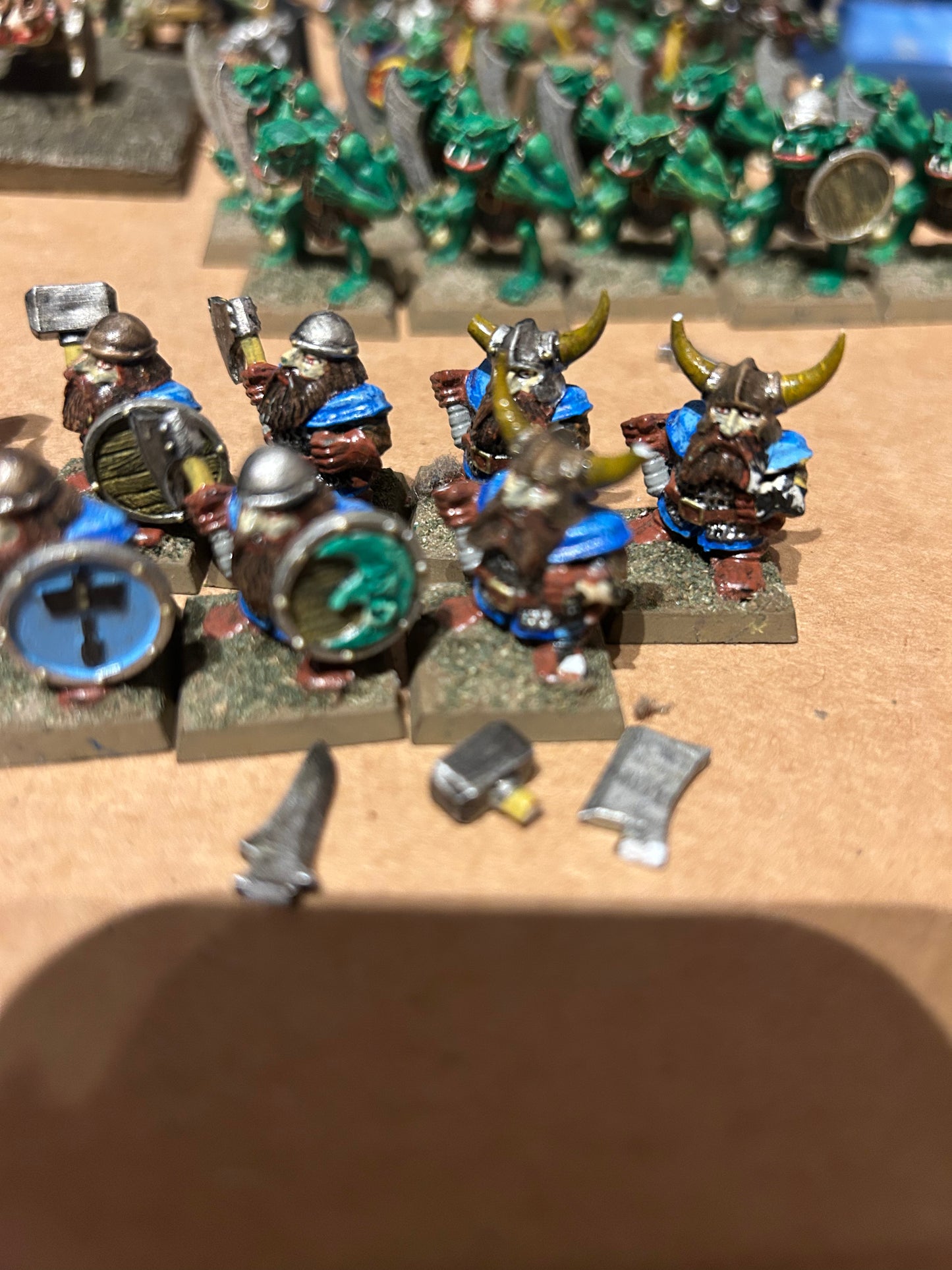 Warhammer fantasy regiments orcs x9 (theee have broken weapons so I’ve included three weapon ends that should fit bjt only the hammer is one that should go with the model I believe; they’ll all fit though)