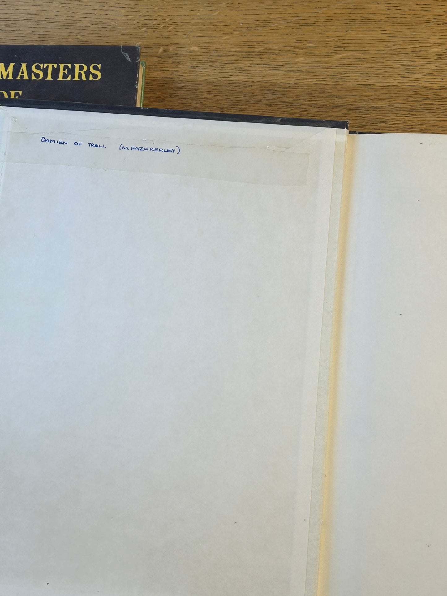 Ad&D Players Handbook Dungeons and Dragons (has been coated in a layer of plastic wrap to protect the book and has the previous owner’s name in it)