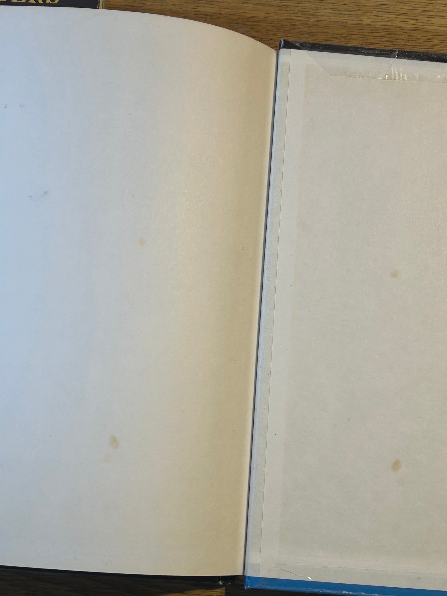 Ad&D Players Handbook Dungeons and Dragons (has been coated in a layer of plastic wrap to protect the book and has the previous owner’s name in it)