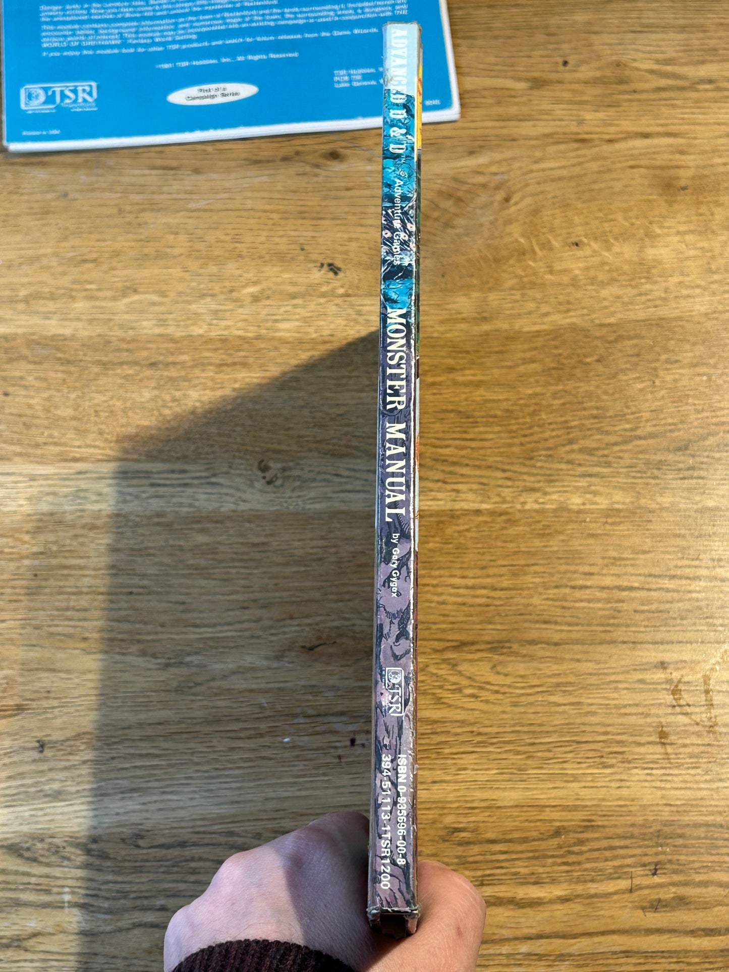 MONSTER MANUAL - Advanced Dungeons &  Dragons - HARDBACK (has been coated in a layer of plastic wrap to protect the book and has the previous owner’s name in it)