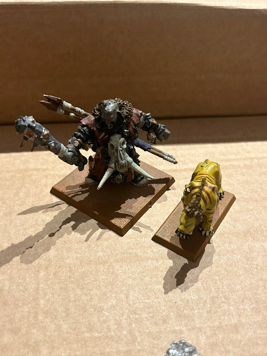 - ogre icebrow hunter with one sabretusk warhammer fantasy metal