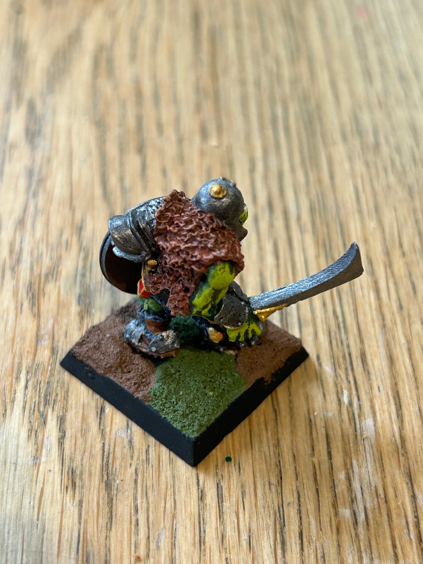 Warhammer fantasy orc leader with sword and shield