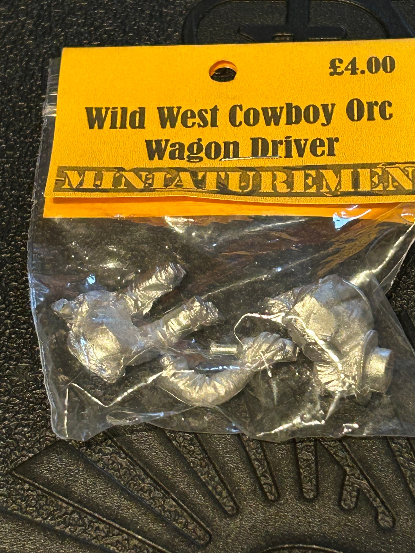 Miniature men Wild West cowboy orc wagon driver (looks to be 54mm scale)