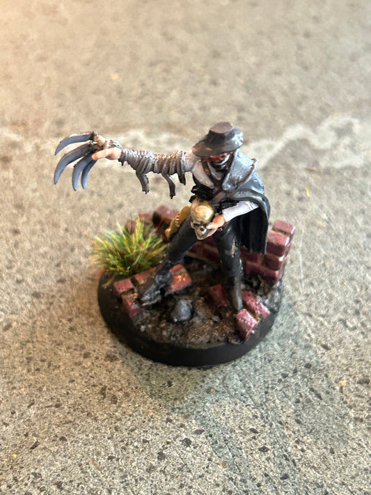 Male with claw, possibly western or horror related, well painted, plastic (I don’t know the company)