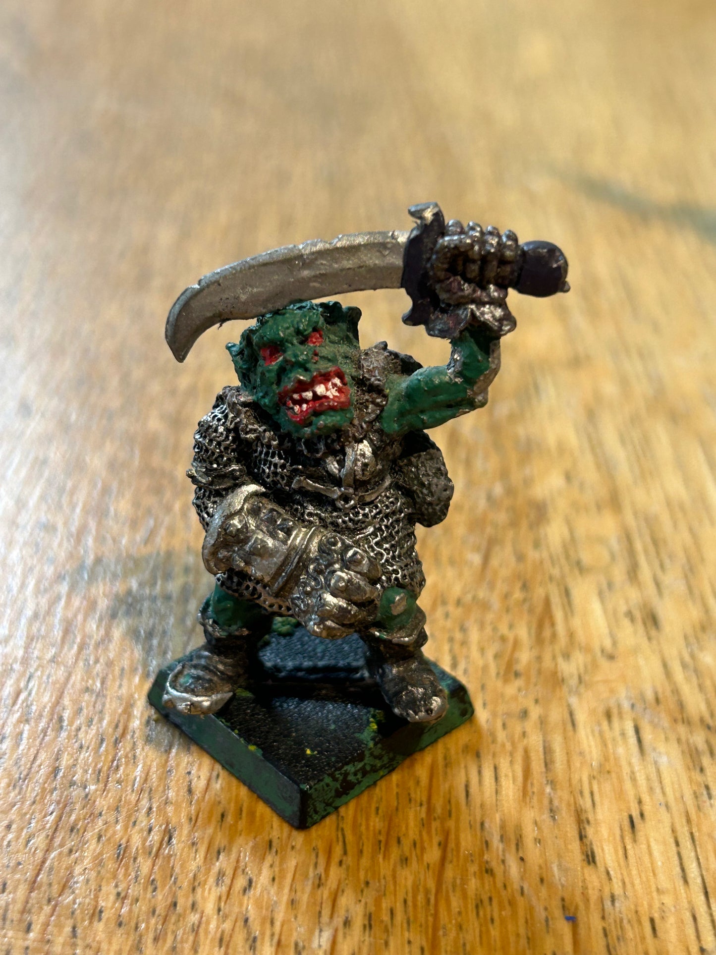Iron claw orc with metal fist and and sword warhammer fantasy orcs and goblins