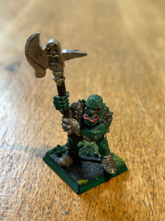Iron claw orc with metal fist and and sword warhammer fantasy orcs and goblins