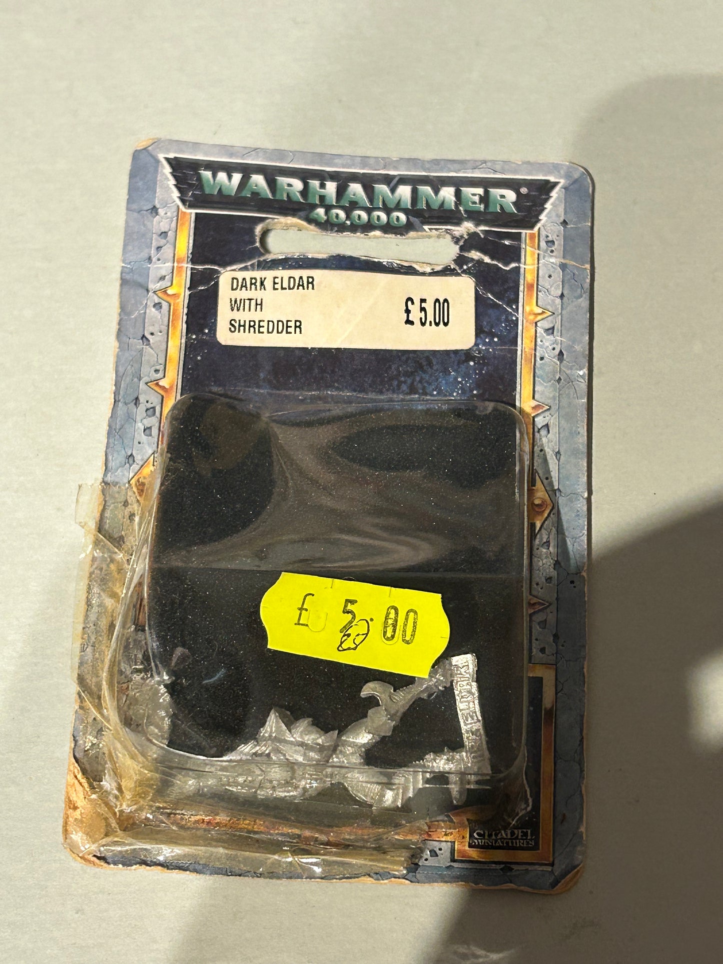 Warhammer 40k Dark Eldar with shredded in partially opened and damaged blister