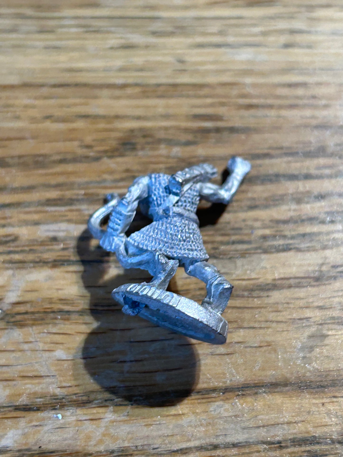 51-0132: Orc Bowman, Advancing, Armored Helmet
 ral partha