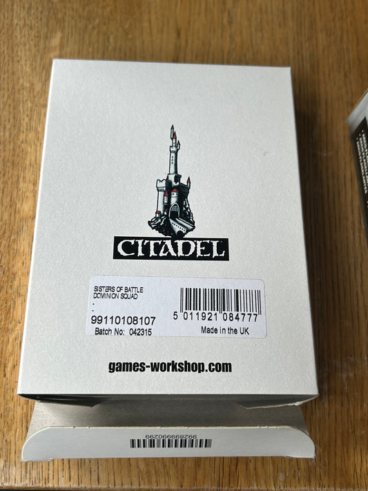 Warhammer 40k: Sisters of Battle Metal Dominion Squad
New in opened box Sisters of Battle